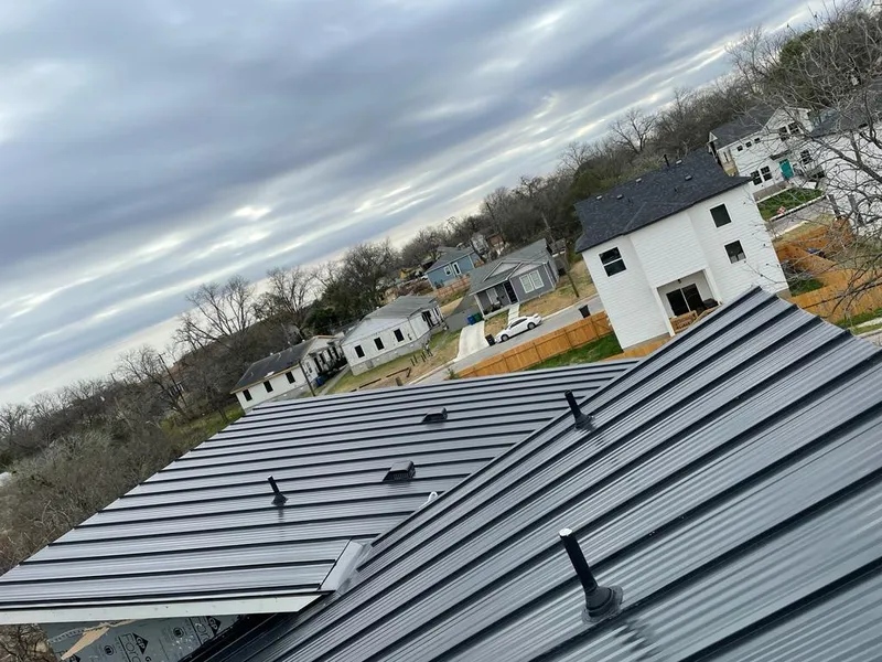 Standing seam metal roof panels with vents for Skylight Repair in Butner